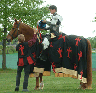 Beth (Sir morgan) recieves her helm from her loyal squire Bubba